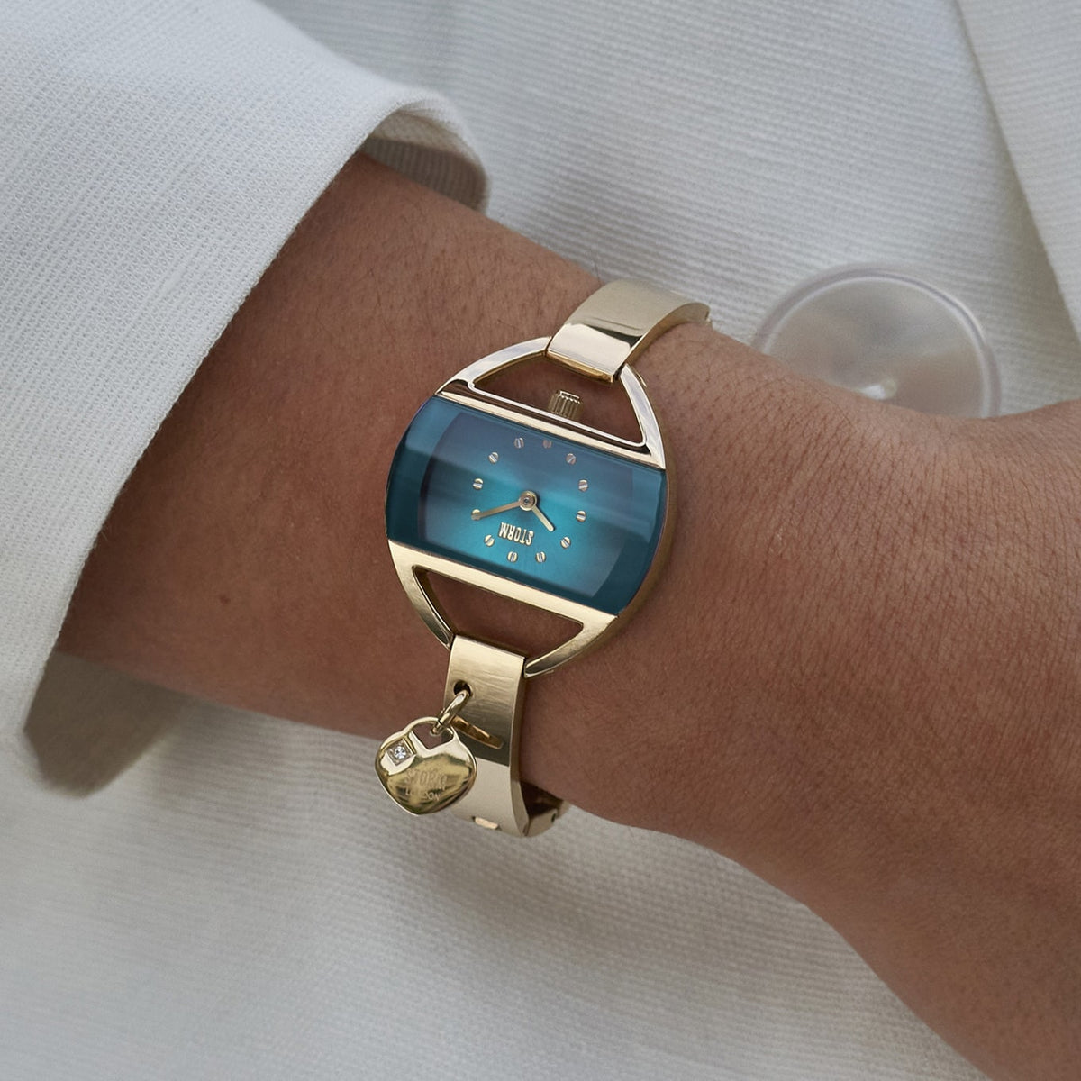 TEMPTRESS CHARM GOLD-TEAL